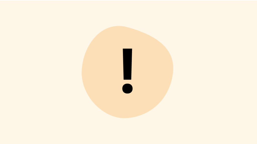 Gulorange bakgrund, svart utropstecken centrerat